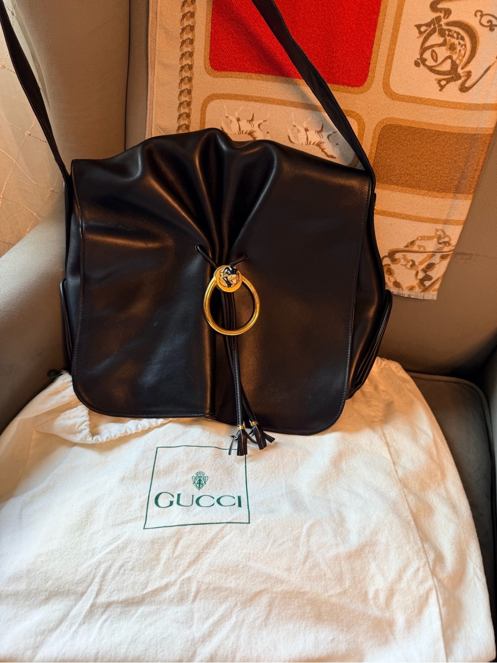 Gucci Black Leather Shoulder Bag with Gold Ring and Tassel